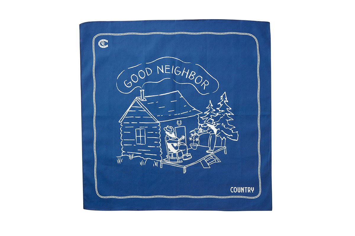 Blue Country Cannabis Bandana with white drawing that shows a man with a beard playing the guitar on a porch and a woman trimming cannabis leaves