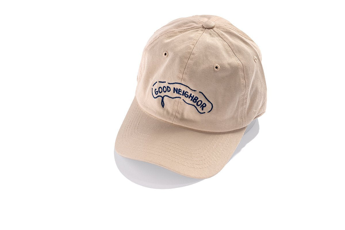 Tan Country Cannabis dat hat with GOOD NEIGHBOR embroidered in navy